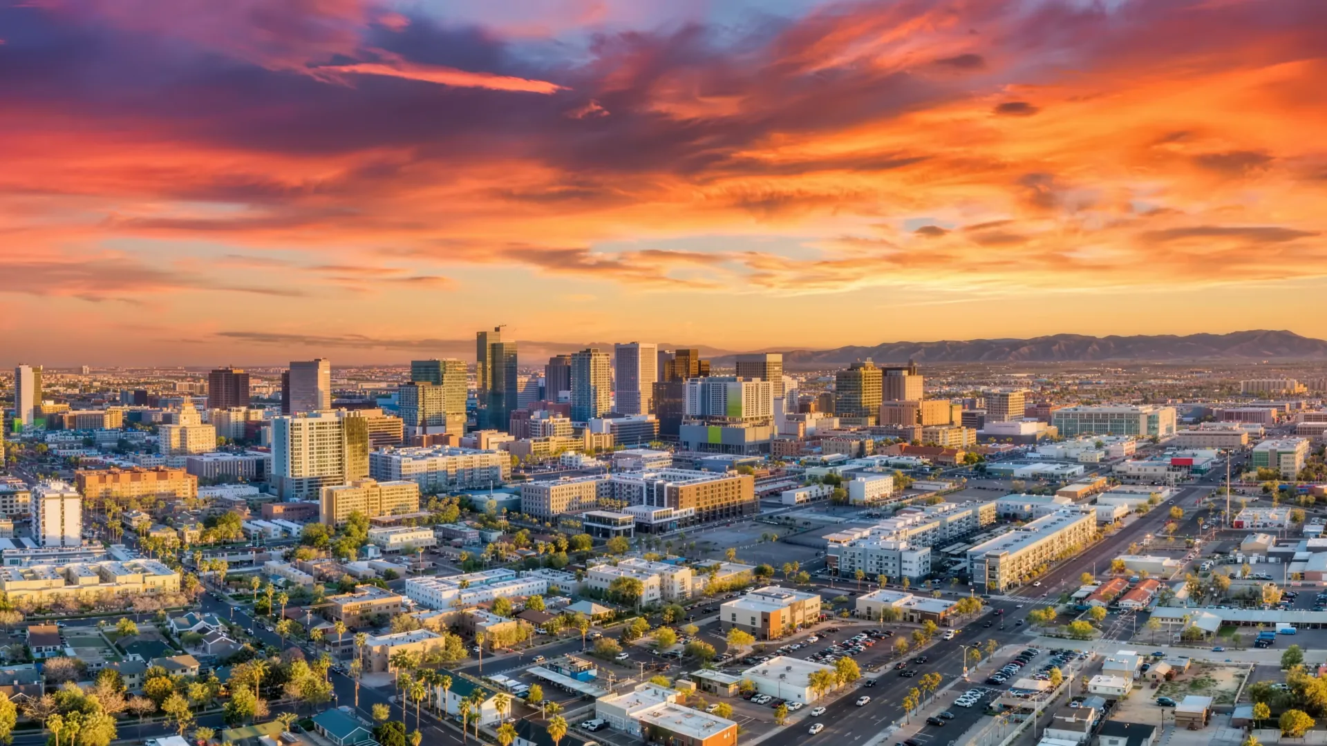Aerial view of Phoenix Arizona homes at dusk — we buy houses in Maricopa County